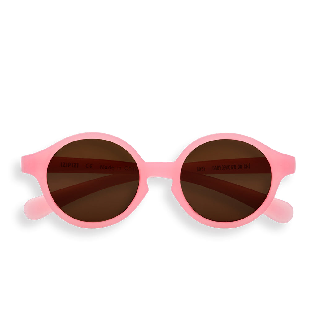 Front view of pastel pink IZIPIZI baby sunglasses